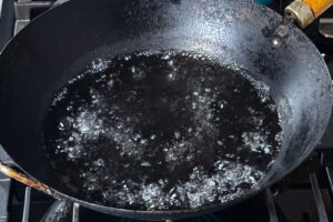 vann fosskoker i wok