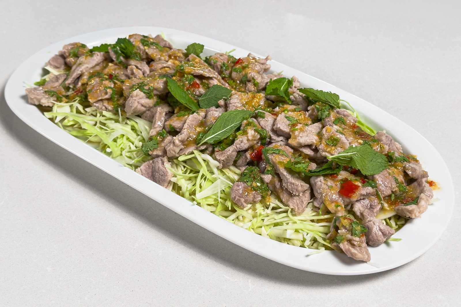 Moo manao – thailandsk svinekjøtt med lime og chili Moo manao - ferdig rett